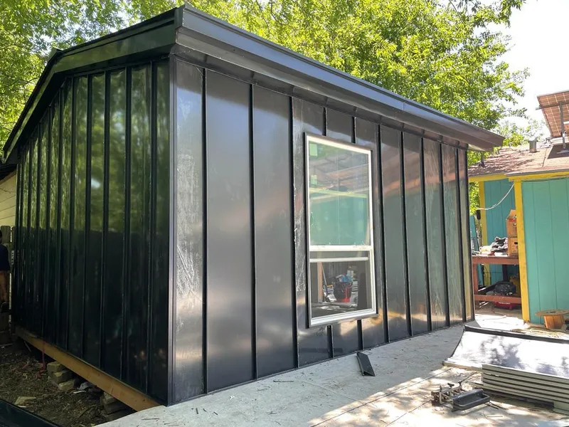 Black standing seam metal wall panels for Roof Inspection in Altoona