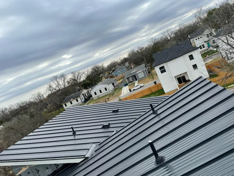 Standing seam metal roof panels with vents for Skylight Repair in Altoona